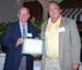 Odenwald receives certificate from Owings